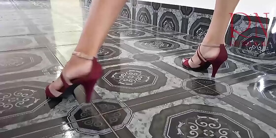 striptease on high heels in empty house