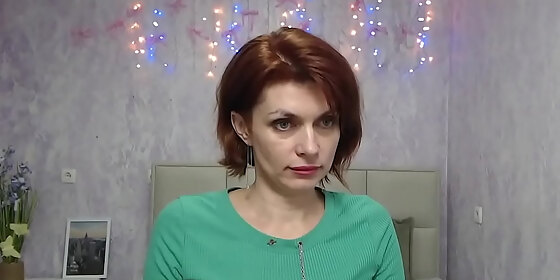 ginger milf in red dress on webcam live show