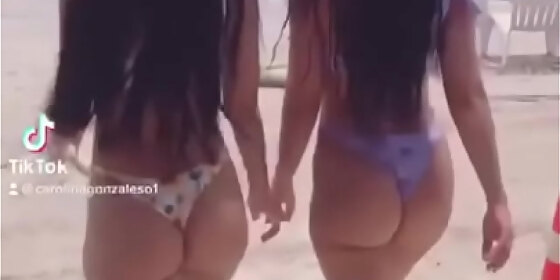 twins showing ass in bikini