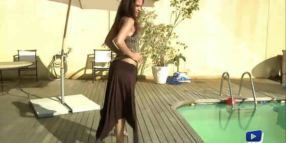 samia duarte likes to fiddle around by the pool