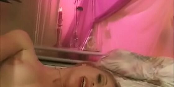 smiling laughing milf masturbater with toy