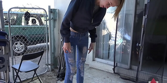 skinny girl in tight jeans sucks ice pop