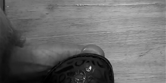 stepping on his cock and making it cum