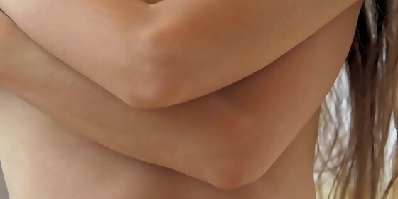 natural brunette with small perky tits teases with her body