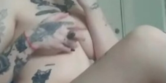fucks her smooth pussy with her fingers very exciting