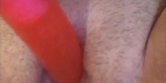 enjoying fucking herself with dildo
