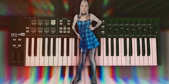 cute girl in minidress loves dancing in music videos