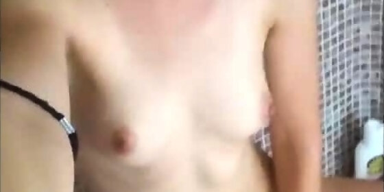 lovely small titted brunette fingering her pussy