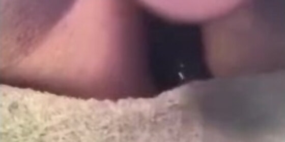 slut squirts all over toy with a butt plug