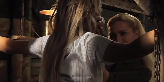 dominant lesbian madame inspecting tied up slave