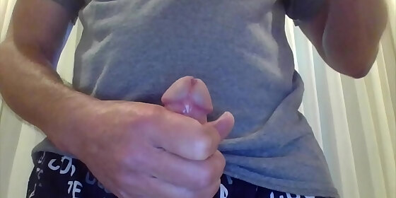 fit dude strokes big headed cock to two nice loads