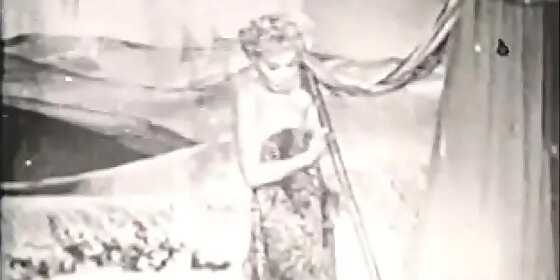 gorgeous retro bitch stripping of robes on set