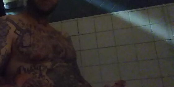 in prison stroking this big white dick in the shower
