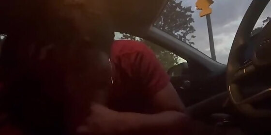 ebony giving head in the car