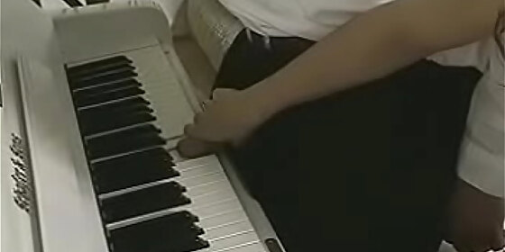 playing the piano with the cock