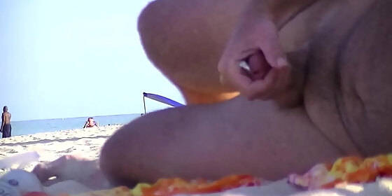 nude beach voyeurs jerking off 1 hubby films all the hard cocks that are cum near his wife on the nude beach