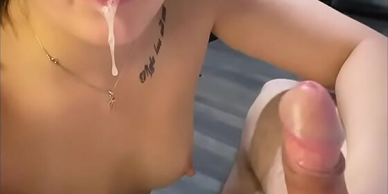 films herself as she sucks a dick and takes cum in her mouth