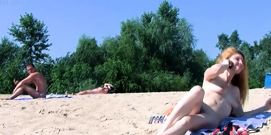 nude beach girl is having a great time