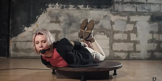 astrid shows her flexibility in hogtie
