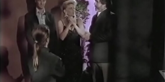 glamorous blonde with big melons meets stud in bar cellar then gets facial