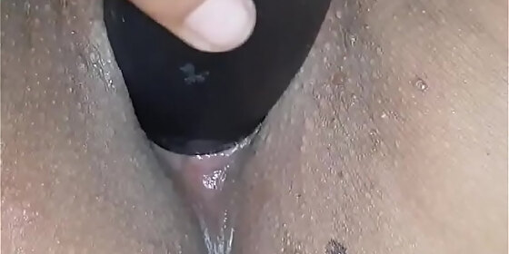 playing with her pussy and her vibrator