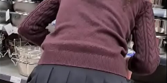 spying teen girl at supermarket short skirt