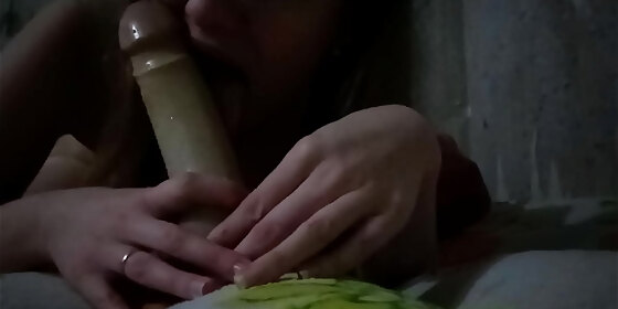 sucking a big rubber pacifier