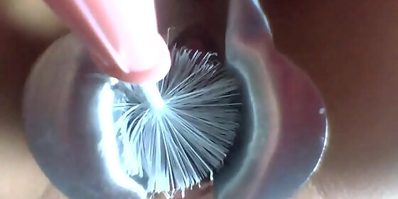 bottle brush in speculum stretched cunt
