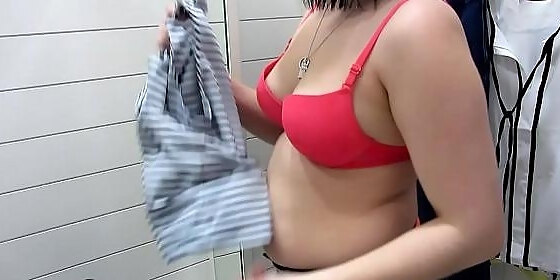 pissing in the public shitter and undress in the dressing apartment at the mall