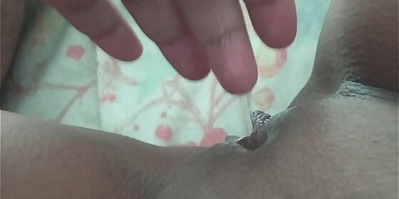 running a hand over the wet pussy