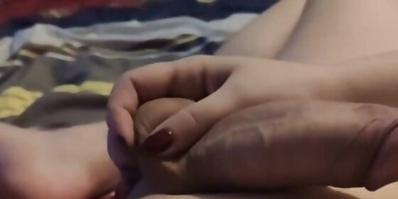 gentle massage of the penis before blowjob