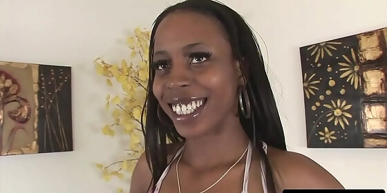 seductive black woman with pretty painted lips greedily sucks gigantic black cock