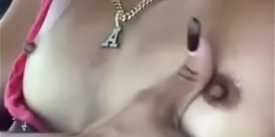sexy latina playing with her nipples in her car