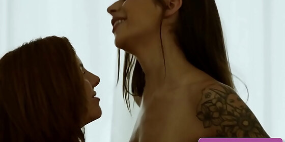 lusty and busty lesbian babes april olsen lumi ray kiss tender and lick their sexy tattooed bodies