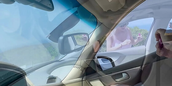 hitchhiker peeing 3 times through the window of a moving car