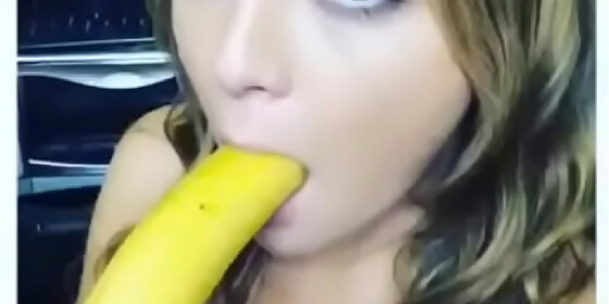 married woman training with a banana