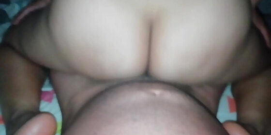 with my wife on her back