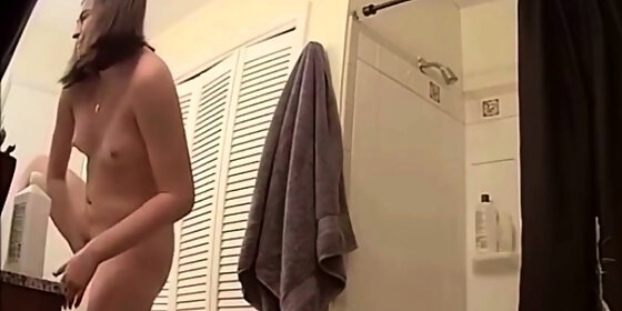 stepsister masturbates in front of the mirror