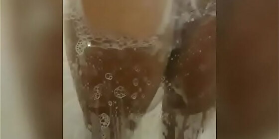 wet hot babe rubs her fleshy pussy and enjoys a lot juicy in the shower and soap the scented rose