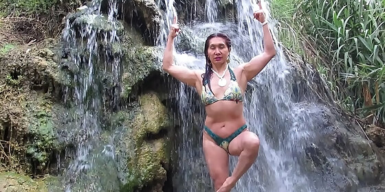 the goddess milf gets wet in a waterfall