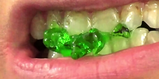 mouth vore close up of fifi foxx eating gummy bears