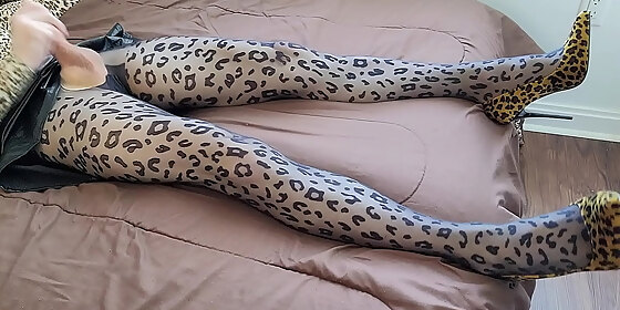 crossdresser jerking off in leopard print pantyhose and heels