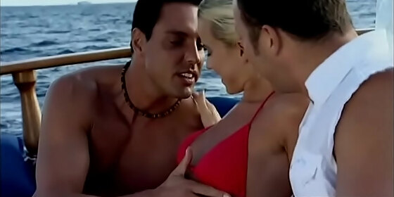 cindy dollar anal fucked on a boat by two guys who give her a facial