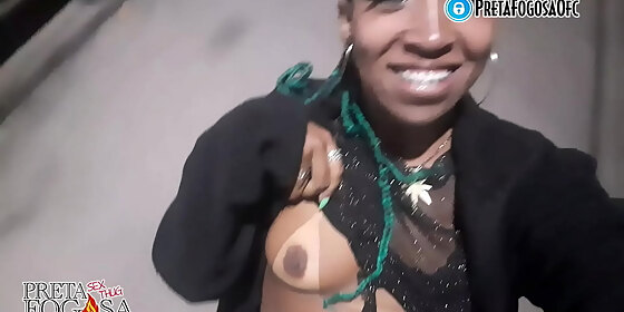 naughty in the street on top of the bike showing breasts to general
