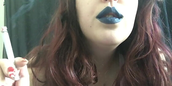 sexy chubby goth teen smoking in navy blue lipstick with slow exhales
