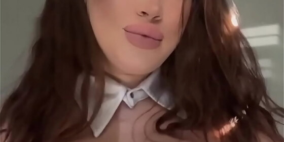 busty teacher wearing a collar teasing her tits