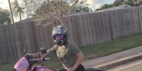 bonnie public flashing while riding motorcycle