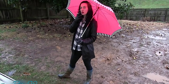 leather gloved smoking in the rain