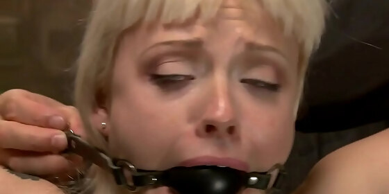 gagged blonde is spanked on hogtie
