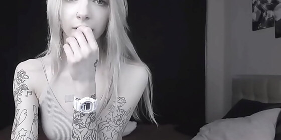 pale slim tattoo camgirl flashes her tits on cam